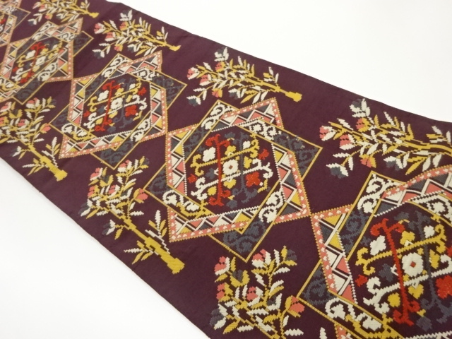 華紋に草木模様織出し名古屋帯